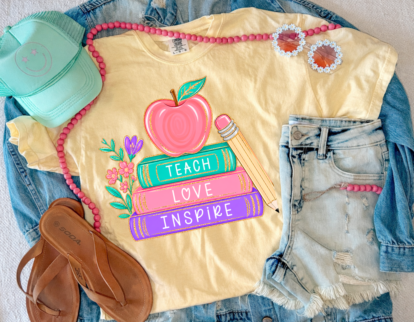 TEACH LOVE IN INSPIRE TEE (BUTTER)