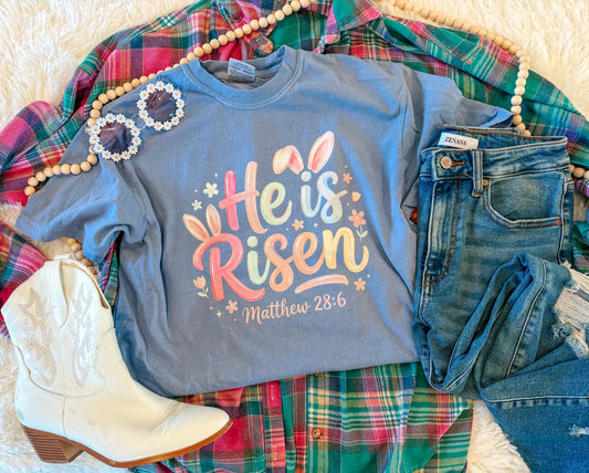HE IS RISEN TEE (L. BLUE)