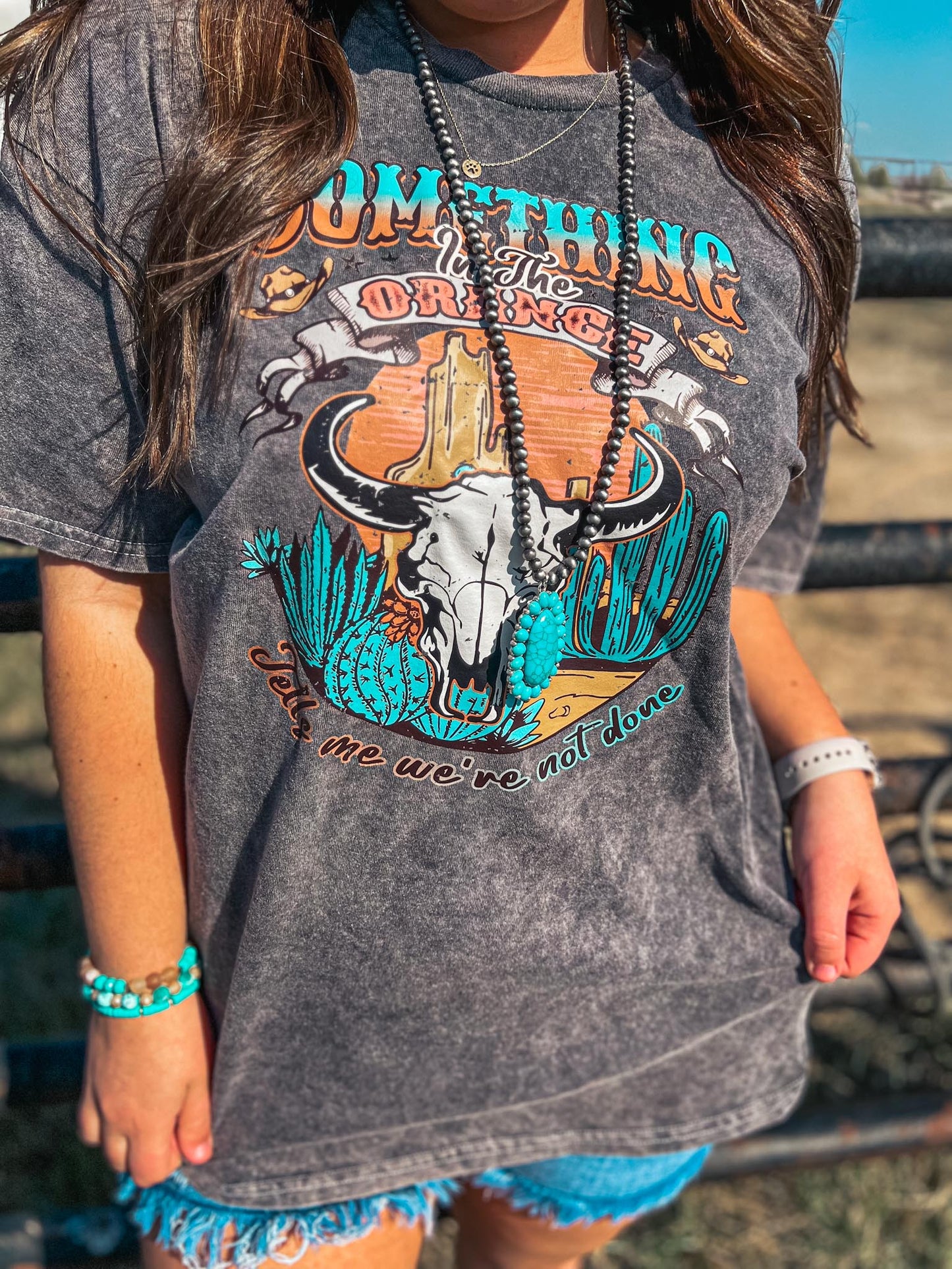 SOMETHING IN THE ORANGE TEE